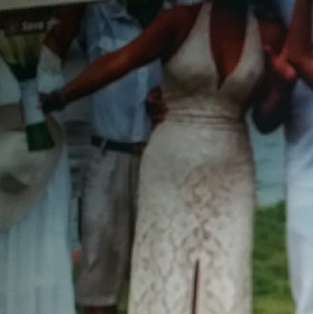 Lace gown with plunging neckline